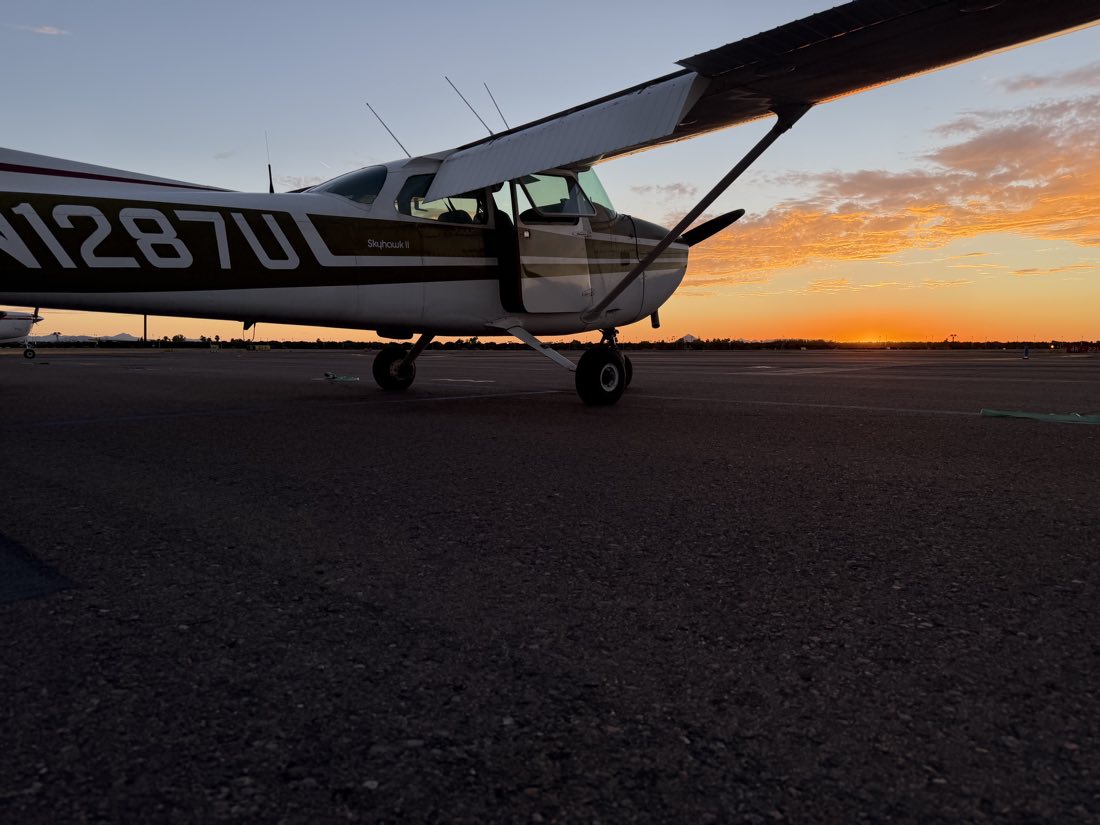 N1287U "Nessie" on the Falcon Field ramp at sunset, cabin door open